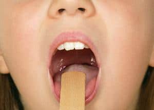 Что делать, если из-за зуба болит горло